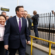 Former Prime Minister David Cameron leaves the train station in Devon with Conservative candidate Anne Marie Morris (left) on April 10, 2015, in Dawlish, United Kingdom. (Kirsty Wigglesworth-WPA Pool/Getty Images)